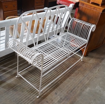 A Victorian style painted wrought iron garden bench, length 137cm, depth 43cm, height 92cm